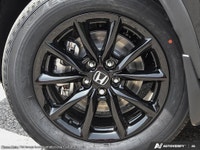 Experience the new 2026 Honda CR-V Hybrid Sport in an elegant black finish, featuring an all-wheel d... (image 7)