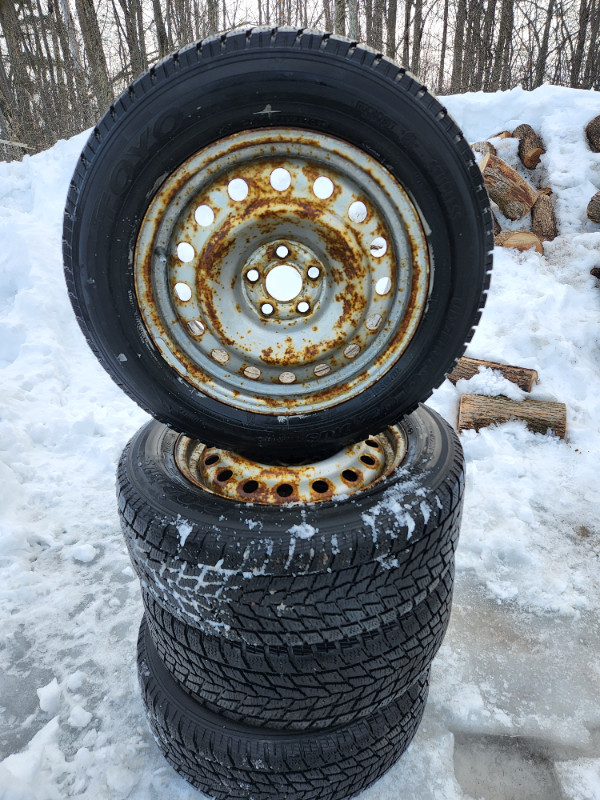 4 tires hiver 215/60/16 toyo avec rims in Tires & Rims in West Island