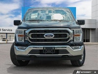This 2022 Ford F-150 XLT crew cab boasts a powerful 2.7L V6 EcoBoost engine, providing ample power f... (image 1)