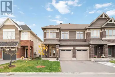 Welcome to this stylish and beautifully maintained Richcraft's end-unit townhome, offering approxima...