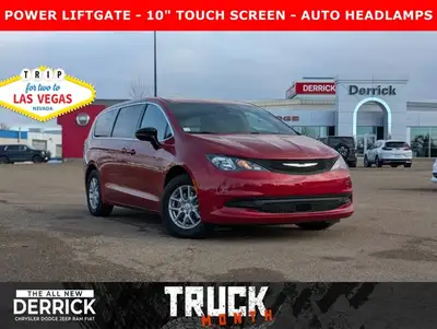 The 2026 Chrysler Grand Caravan SXT in Red Hot Pearl with a Black interior offers a bold look, spaci...