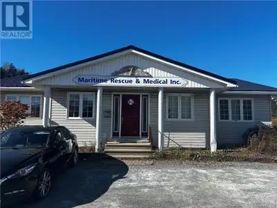 Highly visible office buiding and warehouse/garage property with excellent and easy highway access....