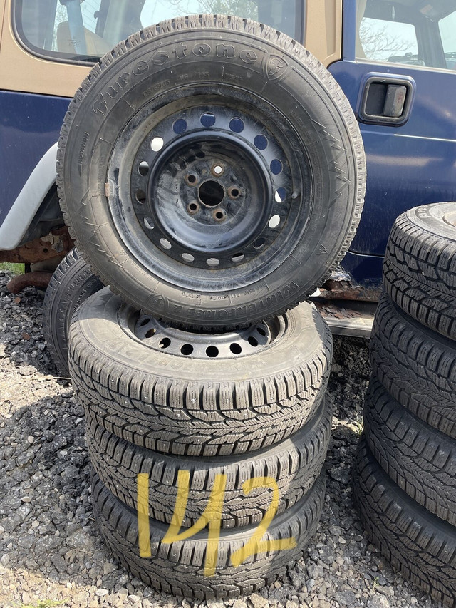 142: 15" FIRESTONE WINTER STUDDED TIRES ON RIMS in Tires & Rims in Oakville / Halton Region