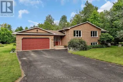 This custom built country estate offering 2+1 bedrooms and 2 full bathrooms boasts approx. 2,634 sq....