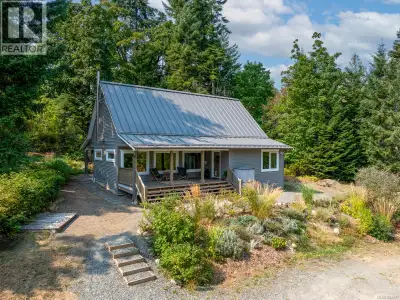 Discover the peace and potential of this private 5+ acre property, where the sound of sea lions and...