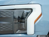 This stunning 2023 Ford F-150 Lightning XLT boasts a powerful dual-motor all-wheel-drive system and... (image 9)