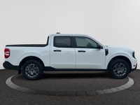 Check out this vehicle's pictures, features, options and specs, and let us know if you have any ques... (image 5)