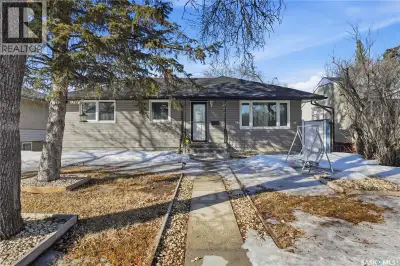 This remarkable 5-bedroom, 2-bathroom bungalow is situated on a tranquil crescent directly across fr...