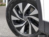 This Volkswagen Tiguan boasts a Intercooled Turbo Regular Unleaded I-4 2.0 L/121 engine powering thi... (image 8)