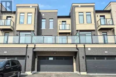 Stunning Never lived in 4 Bedroom, 3.5 Bath Executive Townhome with 4 parking spaces in Desirable No...