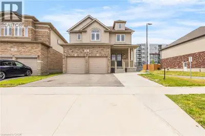 Welcome to 417 Rivertrail Avenue, Kitchener where you will Experience elevated living set in one of...