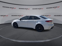 This used 2025 Toyota Corolla SE 2WD | Sunroof | Heated Steering Wheel is a smart hybrid sedan for d... (image 5)