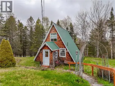 Situated on 3 Acres in a desired rural area and close to all amenities, this affordable A-frame home...