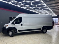The 2025 Ram ProMaster Cargo Van in a clean white finish, equipped with front-wheel drive, is design... (image 3)