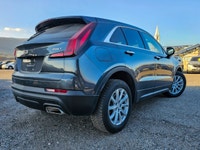 Experience driving sophistication with this 2021 Cadillac XT4 AWD Luxury, presented in a stunning Gr... (image 1)