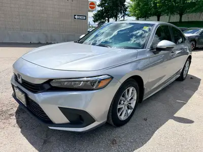 WAS: $27488 NOW: $25488 plus taxes and licensing feesLOW KM & ACCIDENT FREE! 2023 HONDA CIVIC EX CVT...