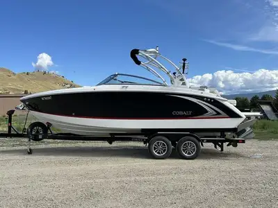 Welcome to Wizard Lake Marine Kelowna Inc.! Fresh trade nice clean '21 Cobalt R5 equipped with Surf...