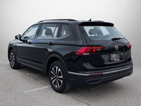 This Volkswagen Tiguan delivers a Intercooled Turbo Regular Unleaded I-4 2.0 L/121 engine powering t... (image 8)