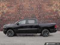 This Ram 1500 delivers a Gas/Electric V-6 3.6 L/220 engine powering this Automatic transmission. TRA... (image 2)