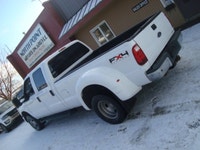 NORTH POINT MOTORS...CALL TEXT 780-224-7791 FINANCING AVAILABLE CHECK OUT THIS 11 FORD F350 CREW CAB... (image 1)