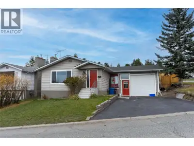 152 Birch Cres, a spacious 5-bedroom, 3-bathroom family home in Logan Lake, BC, situated on a desira...