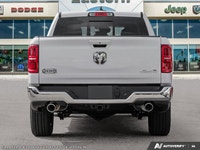 This Ram 1500 has a durable Twin Turbo Premium Unleaded I-6 3.0 L/183 engine powering this Automatic... (image 4)