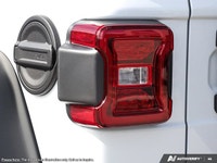 This Jeep Wrangler has a trusty Intercooled Turbo Premium Unleaded I-4 2.0 L/122 engine powering thi... (image 9)