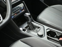 Volkswagen's Tiguan is a European take on an American classicâ€”the SUV. It offers more athletic han... (image 7)