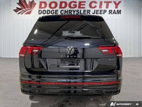 This Volkswagen Tiguan boasts a Intercooled Turbo Regular Unleaded I-4 2.0 L/121 engine powering thi... (image 4)