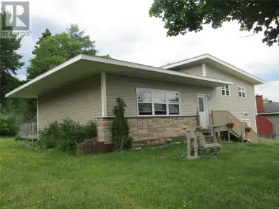 Welcome to 160 Goodyear Avenue! This multi-level home located just across the road from the Central...