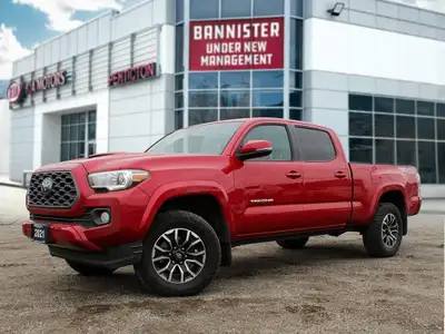 The 2021 Toyota Tacoma 4x4 Double Cab Auto is a striking truck that demands attention, dressed in a...