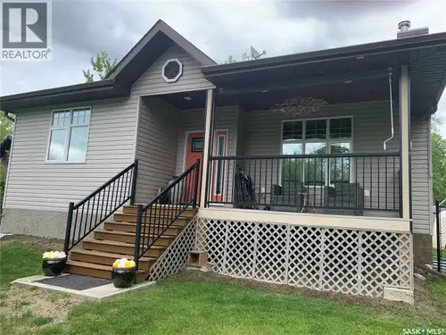 This cozy year round family home is situated on Lac Des Iles Road, about 100 yards from the idyllic...