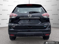 Designed to handle everyday adventures with ease and style, this black 2015 Nissan Rogue Sport Utili... (image 5)