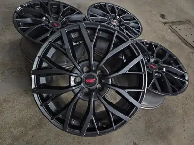 Nice set of original Subaru STI wheels in gunmetal. NOTE: Has minor curbrash. 19x8.5 Offset: 55 Bolt...