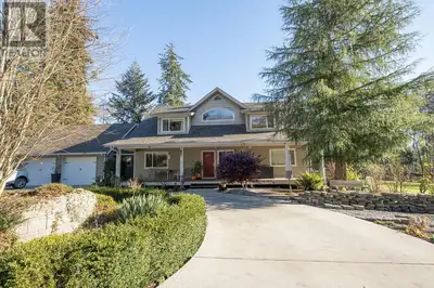 Stunning executive 3100st ft home nestled perfectly into 2.38 acres of fully landscaped gardens.This...