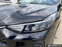 The 2024 Ford Escape ST-Line in sleek black boasts AWD capabilities, making it a versatile and relia... (image 7)