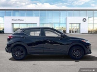 This 2022 Nissan Kicks SV, boasting a sleek Super Black exterior and a stylish charcoal interior, is... (image 5)