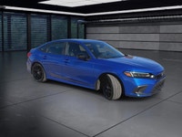 The 2024 Honda Civic Sedan Sport in stylish Blue is a front-wheel-drive masterpiece that promises im... (image 1)