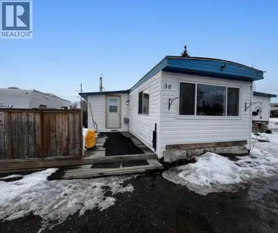 Enjoy affordable, low-maintenance living in the Fraser Lake Trailer Court with this move-in-ready ho...