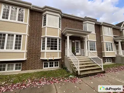 Magnifique condo clé en main, situé sur le golf de Glendale à 800 mètres du parc du Domaine Vert. Mi...