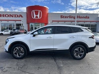 Awarded an IIHS Top Safety Pick, the 2023 Kia Sportage LX in striking Snow White Pearl ensures peace... (image 7)