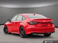 The 2025 Honda Civic Sedan Hybrid Sport eCVT is a standout choice with its vibrant red exterior and... (image 3)