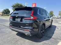 Experience the refined luxury and efficiency of this 2025 Honda CR-V Hybrid Touring, boasting a slee... (image 4)