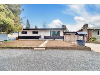 GOLDEN opportunity! Rancher with basement on a huge flat 11,550 sq ft lot (70' x 165') offering 2,30...