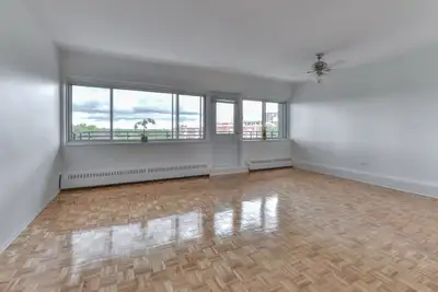 This building offers many features including: - Secured access with surveillance camera - On-site ma...