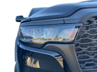 This 2026 RAM 1500 REBEL CREW CAB 4X4 has the following options Lux Leather Trimmed Bucket Seats, Re... (image 4)