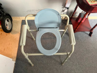 Barely used foldable commode chair