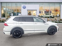 This Volkswagen Tiguan delivers a Intercooled Turbo Regular Unleaded I-4 2.0 L/121 engine powering t... (image 5)