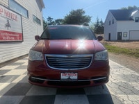 A spacious family minivan with comfortable seating, convenient features, and versatile cargo space,... (image 1)