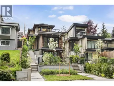 Custom-built contemporary residence in sought-after Calverhall, designed by renowned architect Micha...